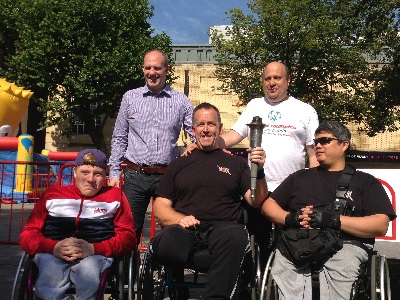 Justin Welcomes Flame Of Hope To Swindon