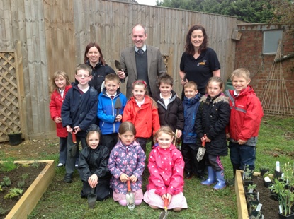 Justin Helps Grange Infants Create Their Own Bee Friendly Garden