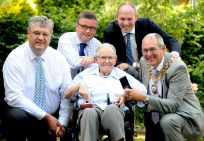 Justin Proudly Presents Medal to Arctic Convoy Veteran