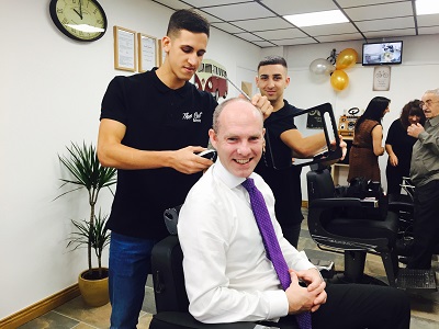 Justin Cuts The Ribbon At New Barbers