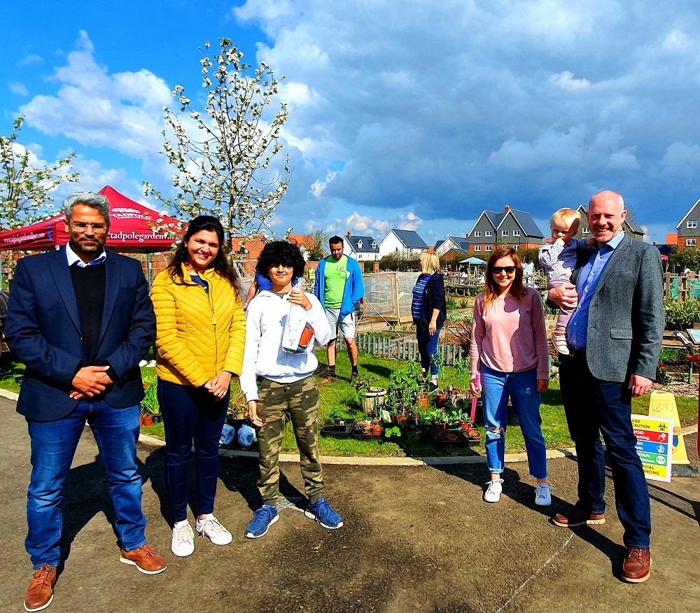 Justin Joins Community Gardeners To Open New Greenhouse